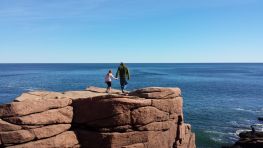 Scot and Luna Rock-Hopping at Thunder Hole.