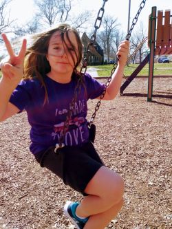 Luna in the park. Not too old to use the swings. Holland, Michigan girl park swing michigan