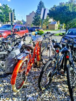 Bicycle located. Benno Bike Red Orange Bike Rack