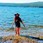 Via kayak, a stop at the beach. payette lake girl swim mccall